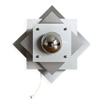 Space age wall lights. 1970. Brushed stainless steel.