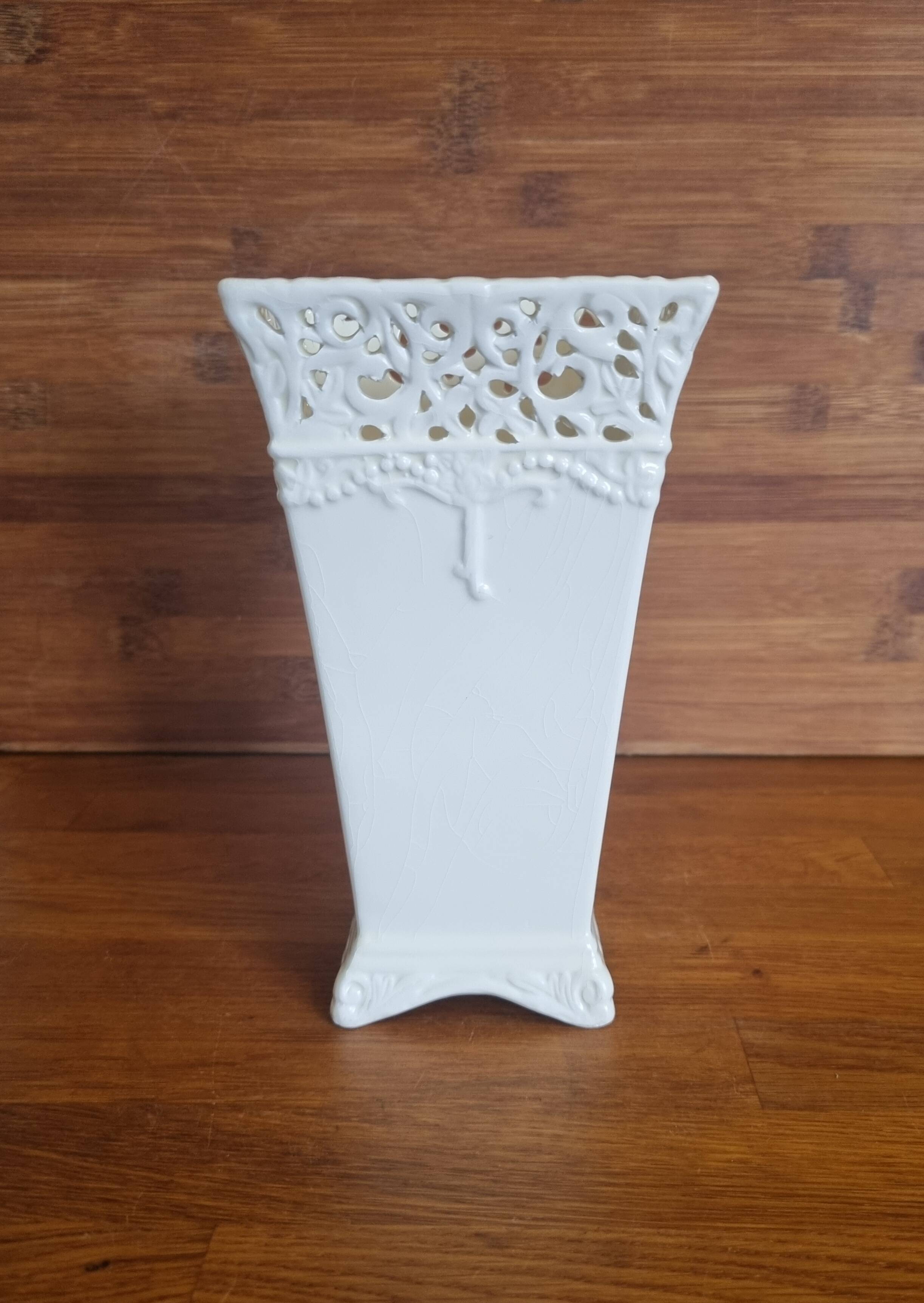 Vintage ceramic vase with lace edge
