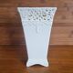 Vintage ceramic vase with lace edge