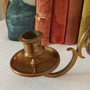 Pair of antique wall-mounted brass candle holders