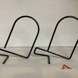 Pair of black metal bookends A