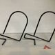 Pair of black metal bookends A