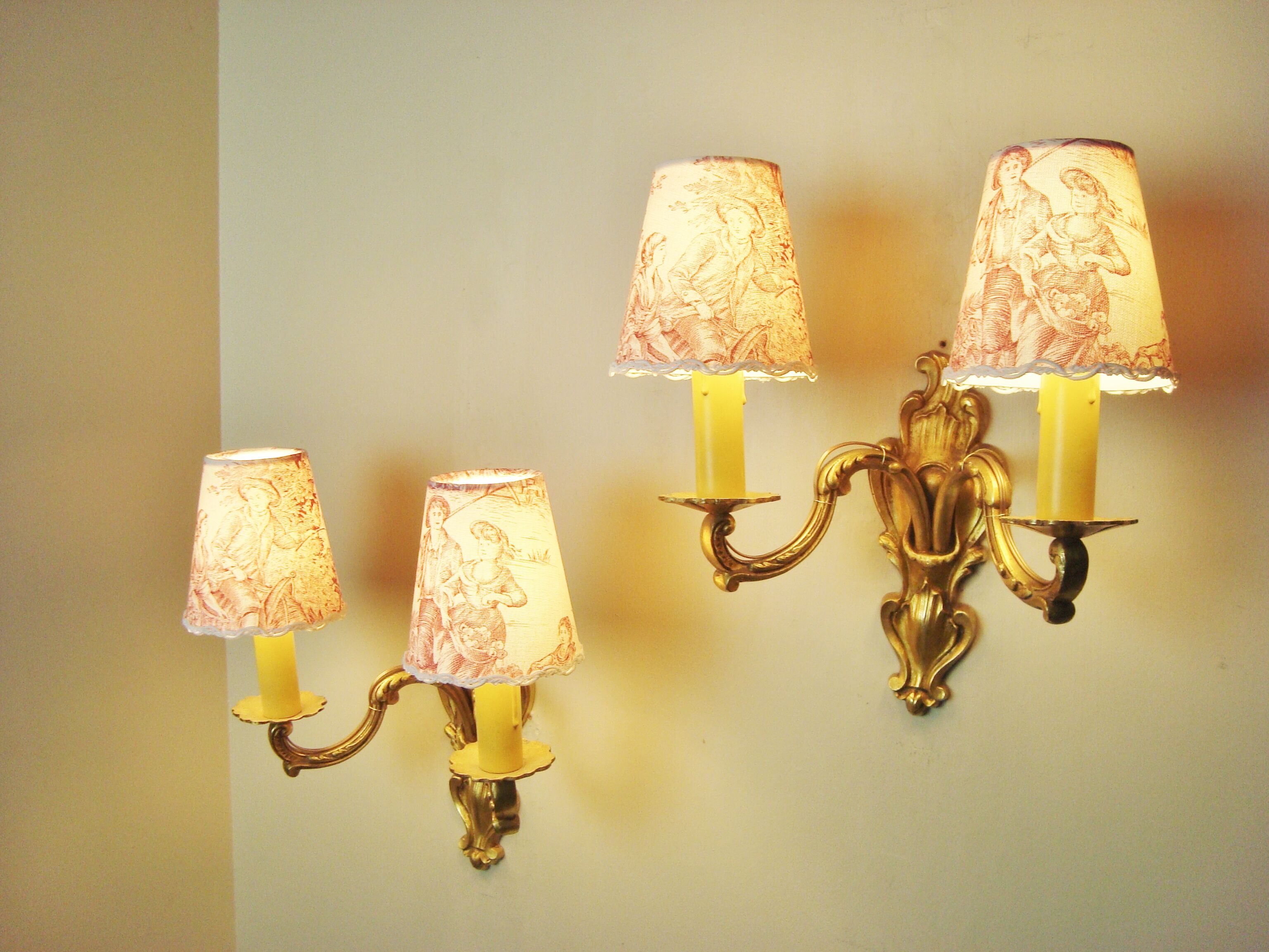 Pair of bronze sconces with four handmade toile de Jouy lampshades in France