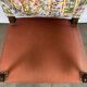 Ancien fauteuil de style bois et tissu décor licorne