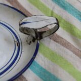 Old enamel candle holder