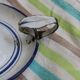 Old enamel candle holder