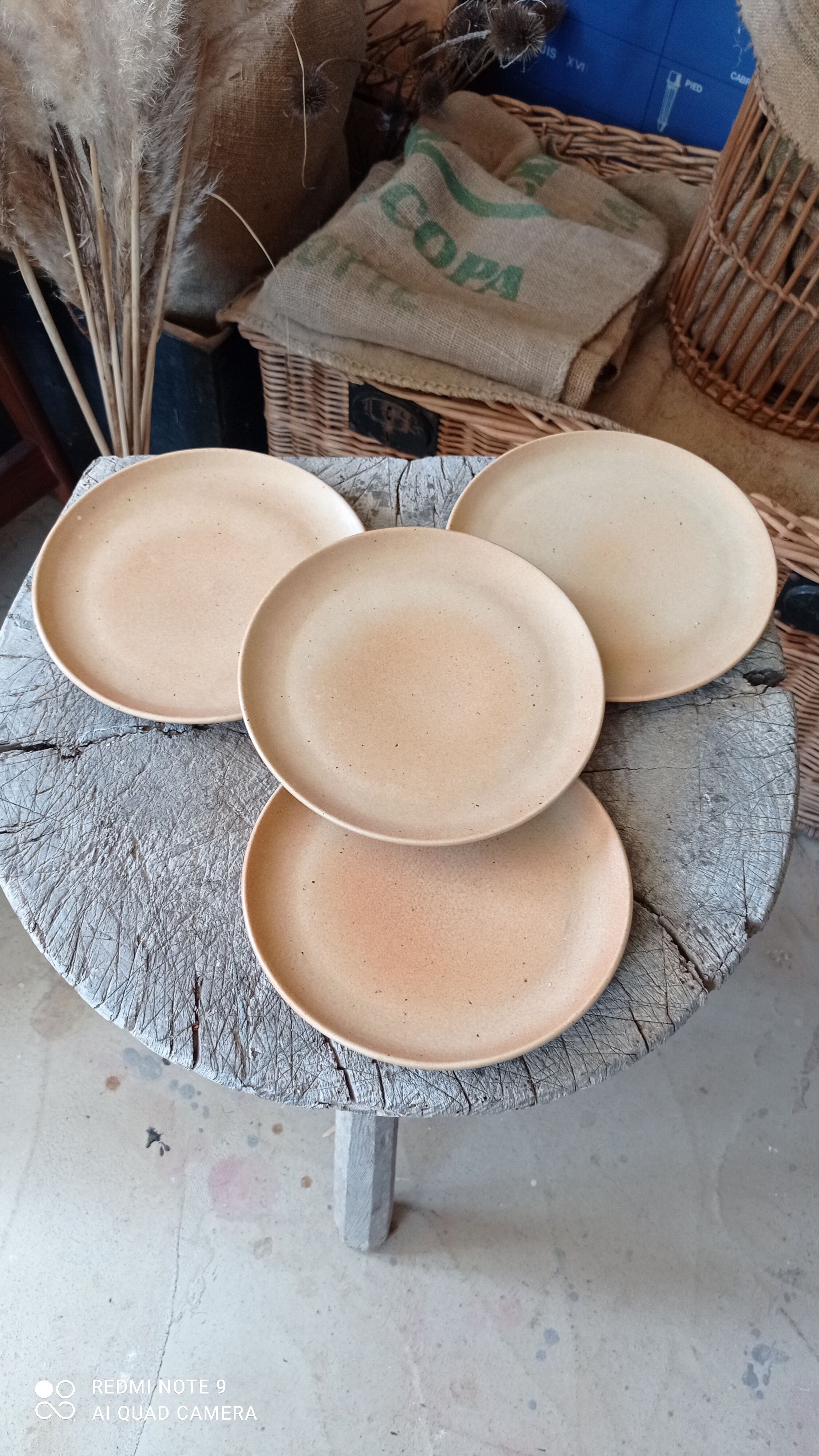 Set of four plates in sandstone