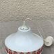 Pendant lamp, white opaline globe with a vintage red design floral pattern 1970