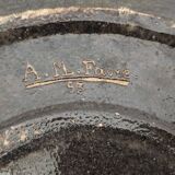 Glazed terracotta dish from Dauphiné signed AM Faure 1953