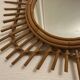 Vintage guitar-shaped rattan mirror