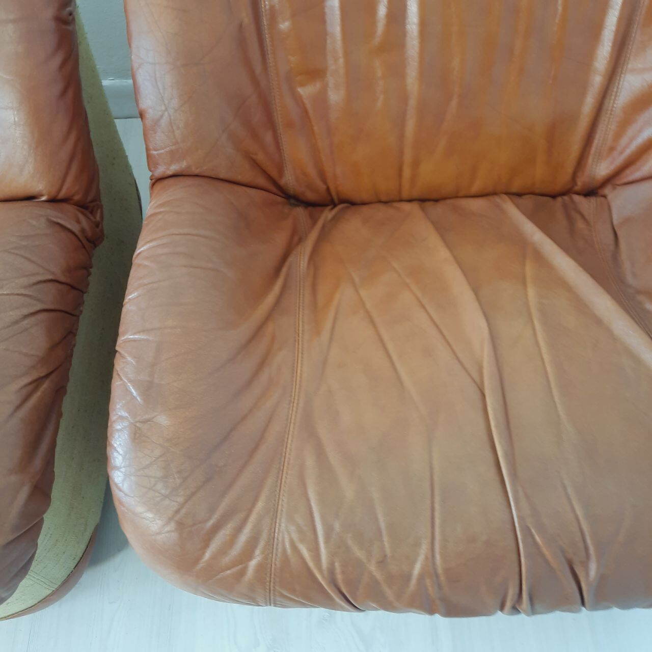 Four vintage armchairs, leather and fabric, 70s