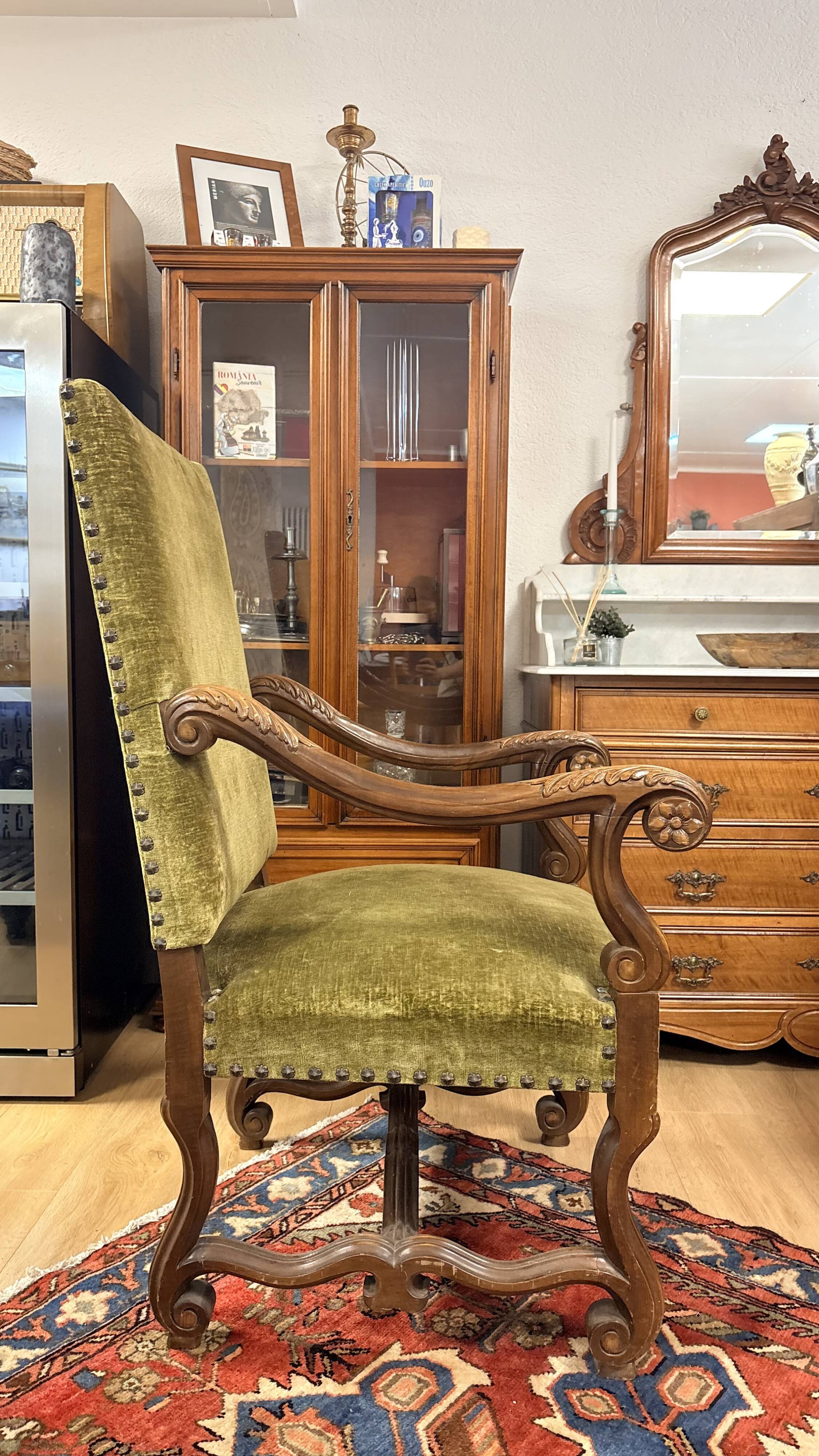 Magnificent armchair in carved solid walnut, in the Henri II style.