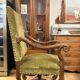 Magnificent armchair in carved solid walnut, in the Henri II style.