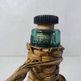 old bottle dressed in rattan vintage pilgrim gourd
