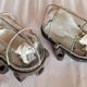 Pair of oval porthole wall lights in bakelite and glass