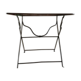 Folding riveted iron table