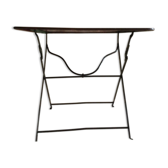 Folding riveted iron table