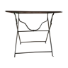 Table en fer rivetée pliante