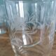 Old digestif or liqueur glasses, handcrafted glass with a floral pattern.