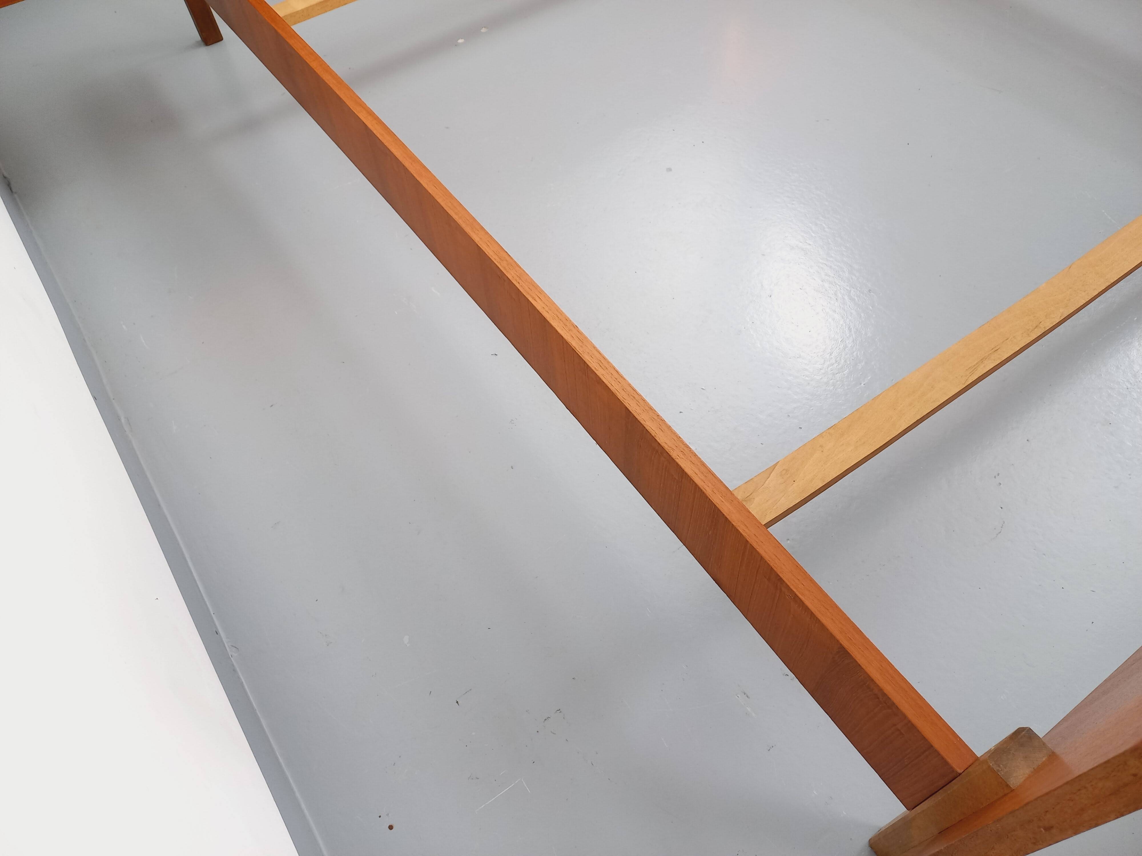 Vintage Scandinavian style double bed in teak from the 60s with integrated bedside lights