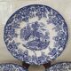 4 earthenware plates with floral and pastoral scene motif