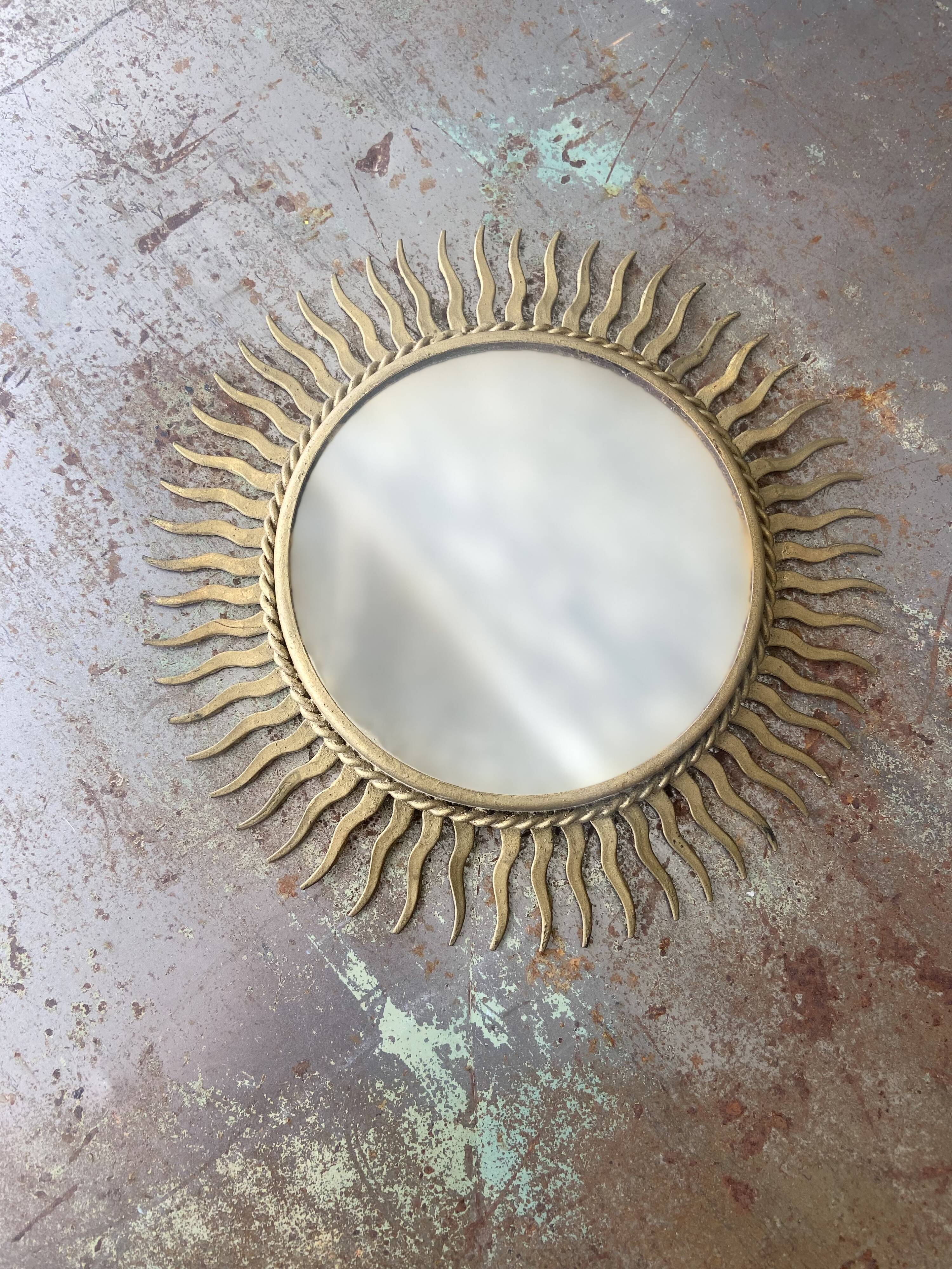 Vintage gold metal sun mirror