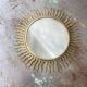Vintage gold metal sun mirror