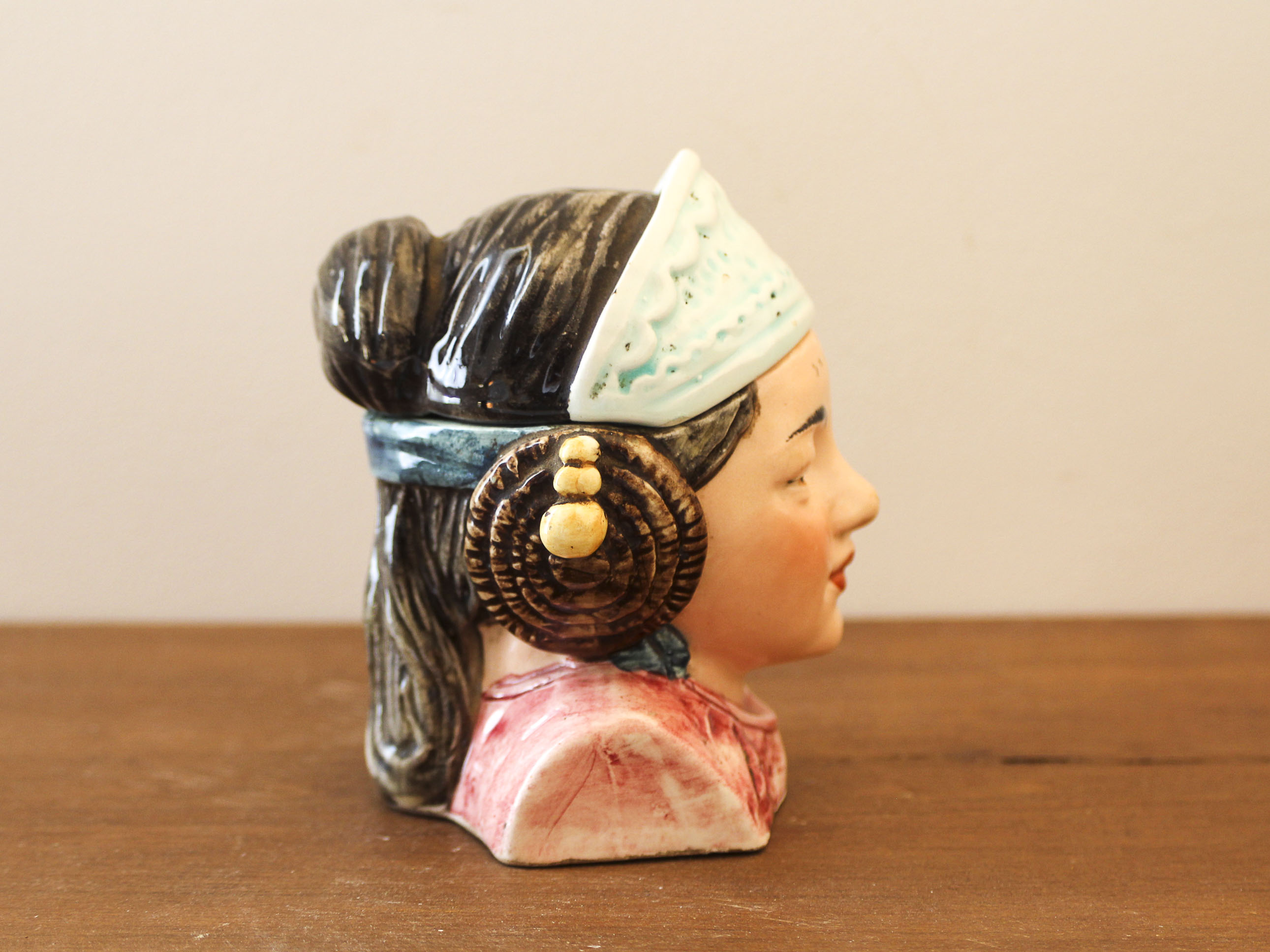 Tobacco pot woman's head in folk headdress