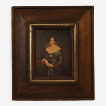 Portrait painting with wooden frame and gilding