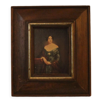 Portrait painting with wooden frame and gilding