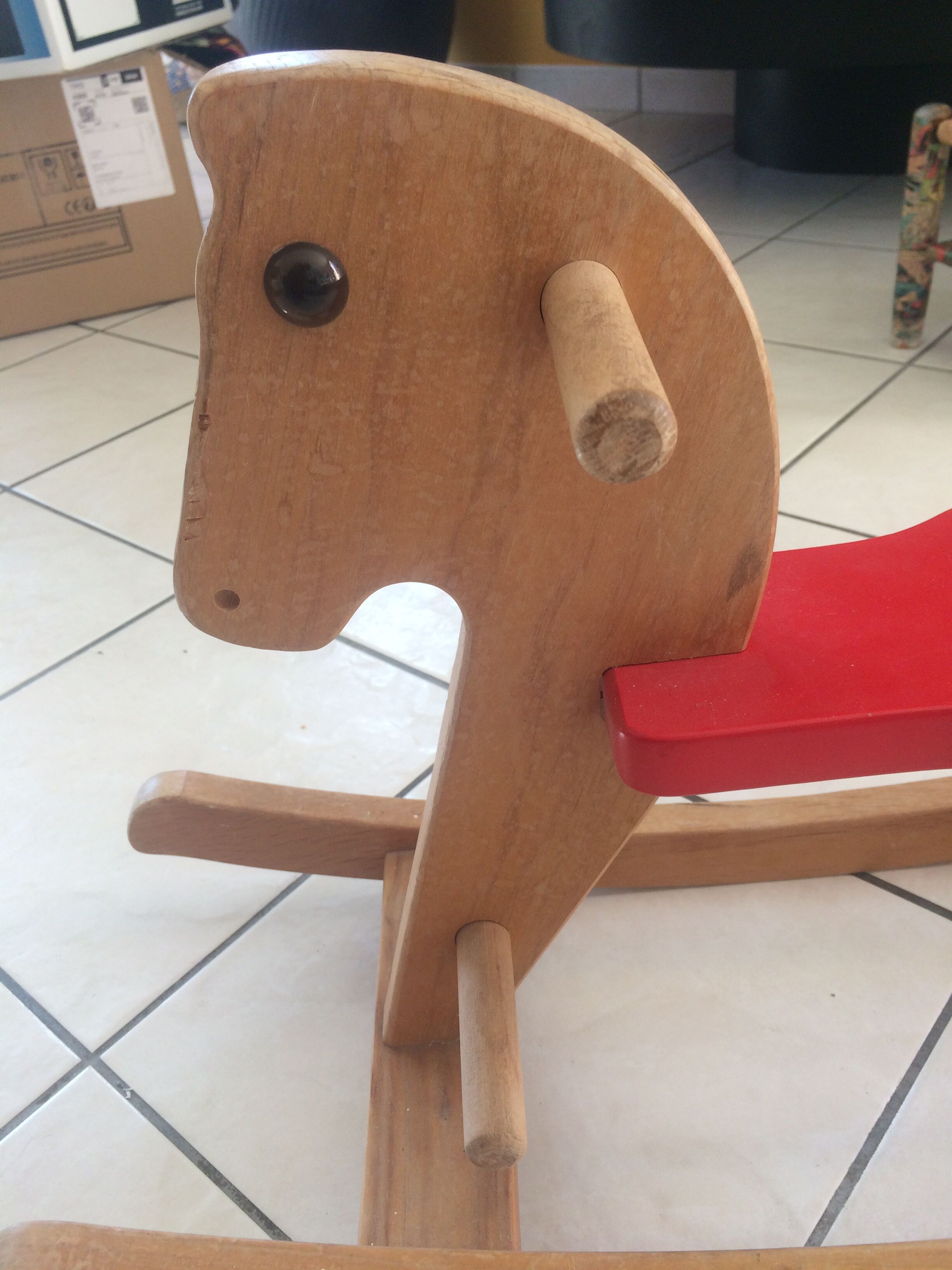 Rocking horse of the 70's in light wood