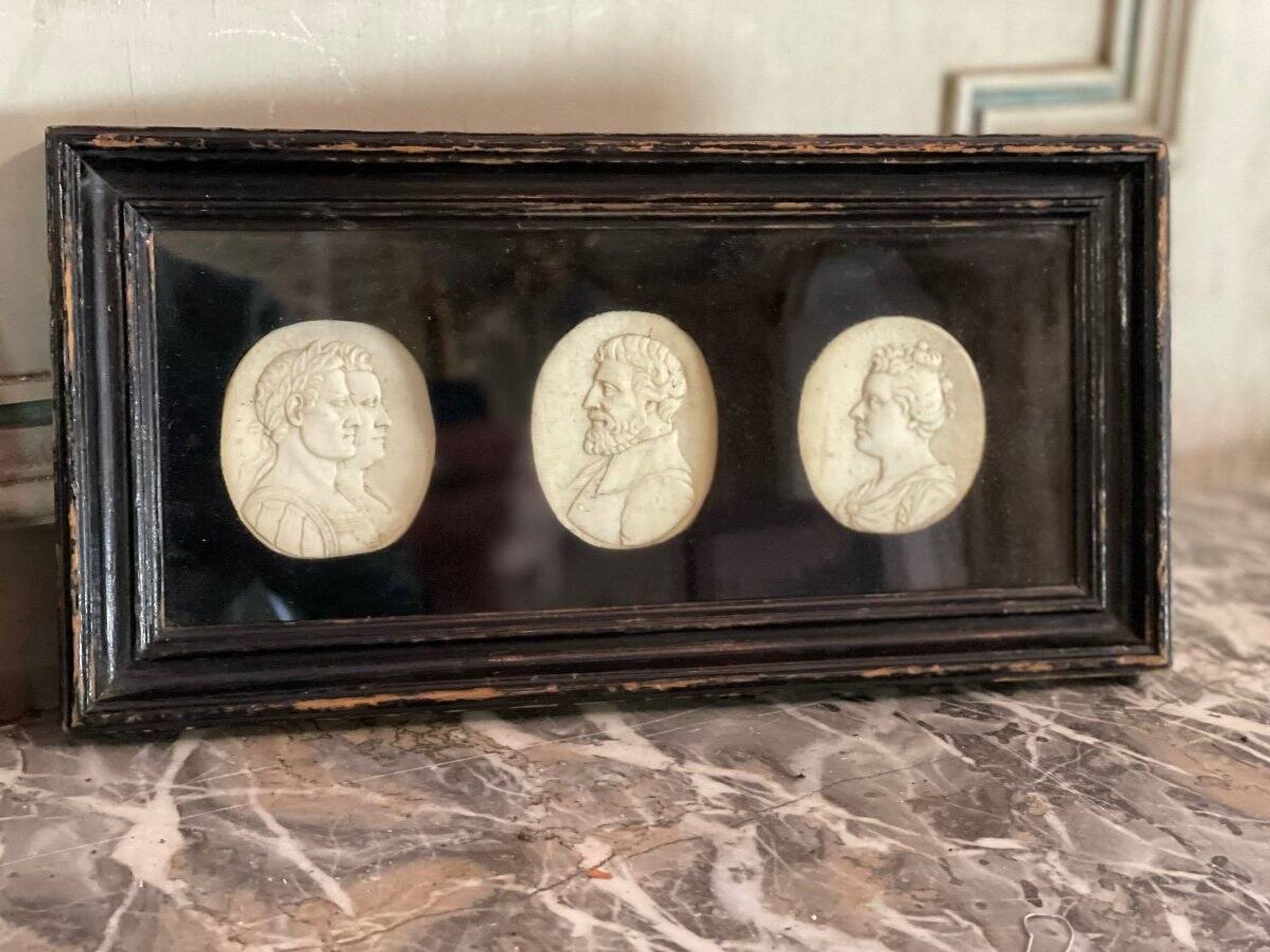 Sculpted ivory portrait suite, England circa 1880, sold in accordance with CITES regulations.