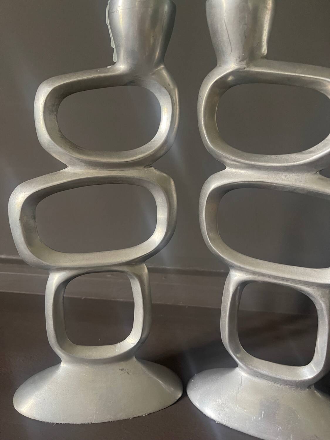 Pair of aluminum candlesticks