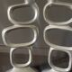 Pair of aluminum candlesticks