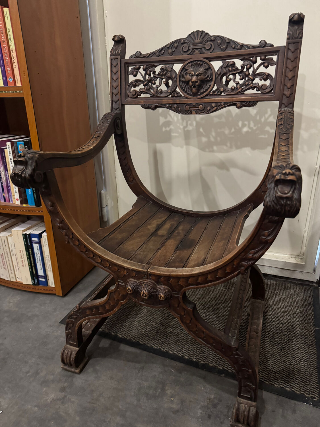 Curule Dagobert armchair in walnut