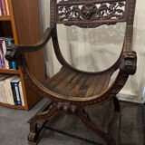 Curule Dagobert armchair in walnut