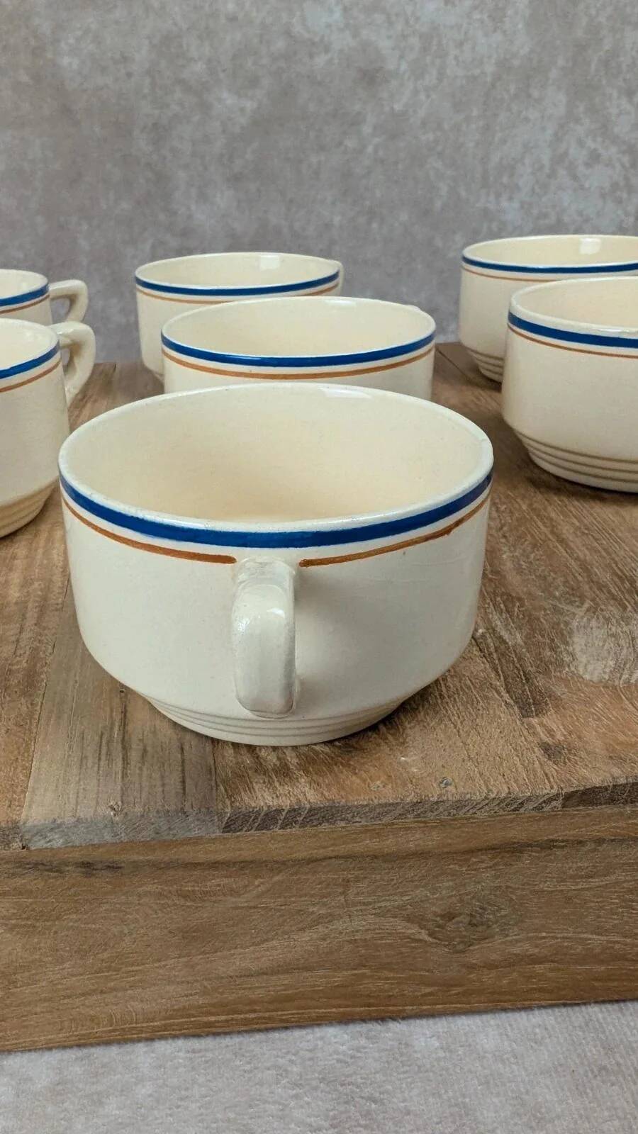 Set of 7 vintage cups Moulin des Loups – Blue and ochre trim, retro charm