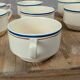 Set of 7 vintage cups Moulin des Loups – Blue and ochre trim, retro charm