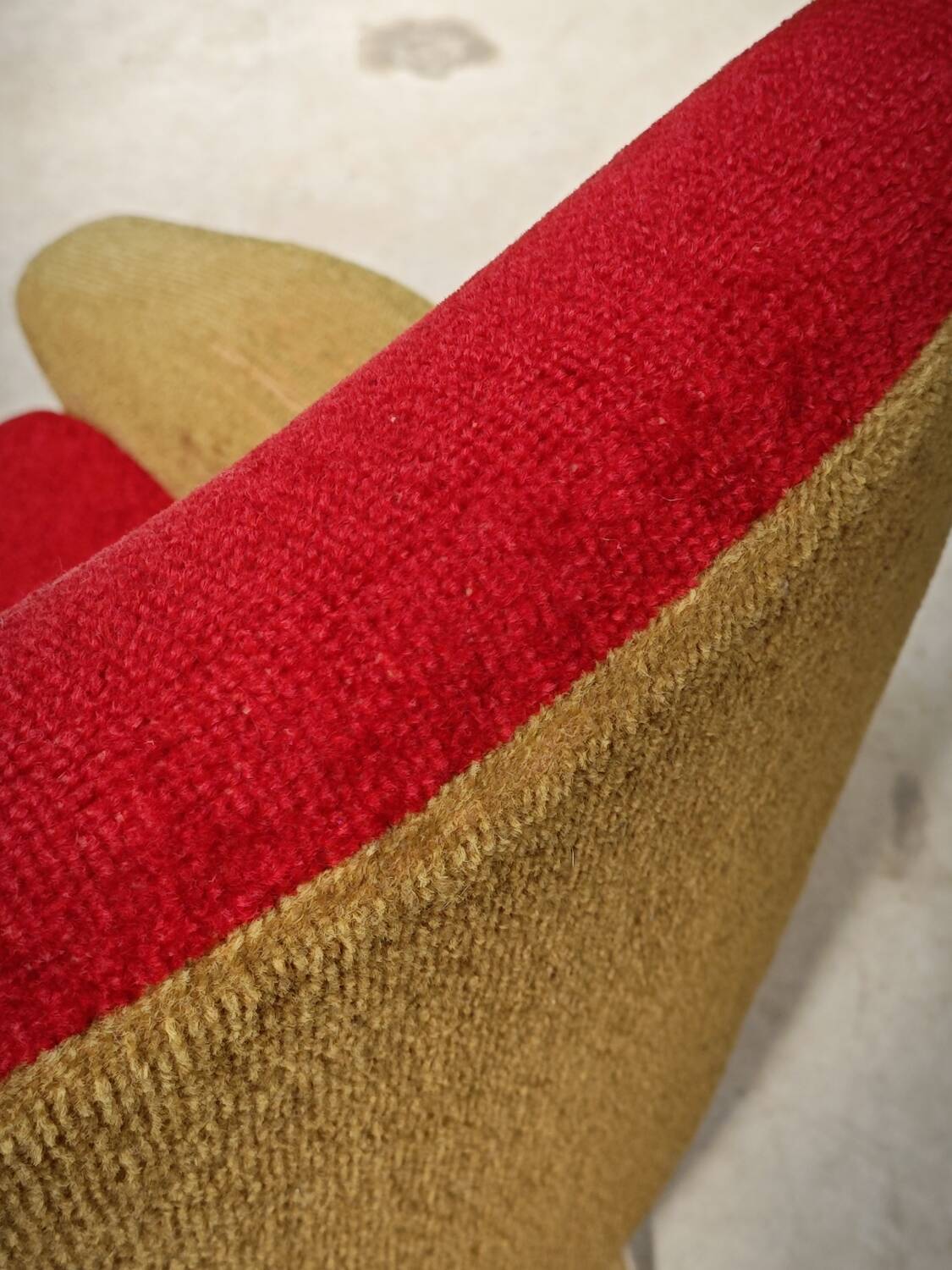 Red and mustard yellow fabric armchair in 1970s style