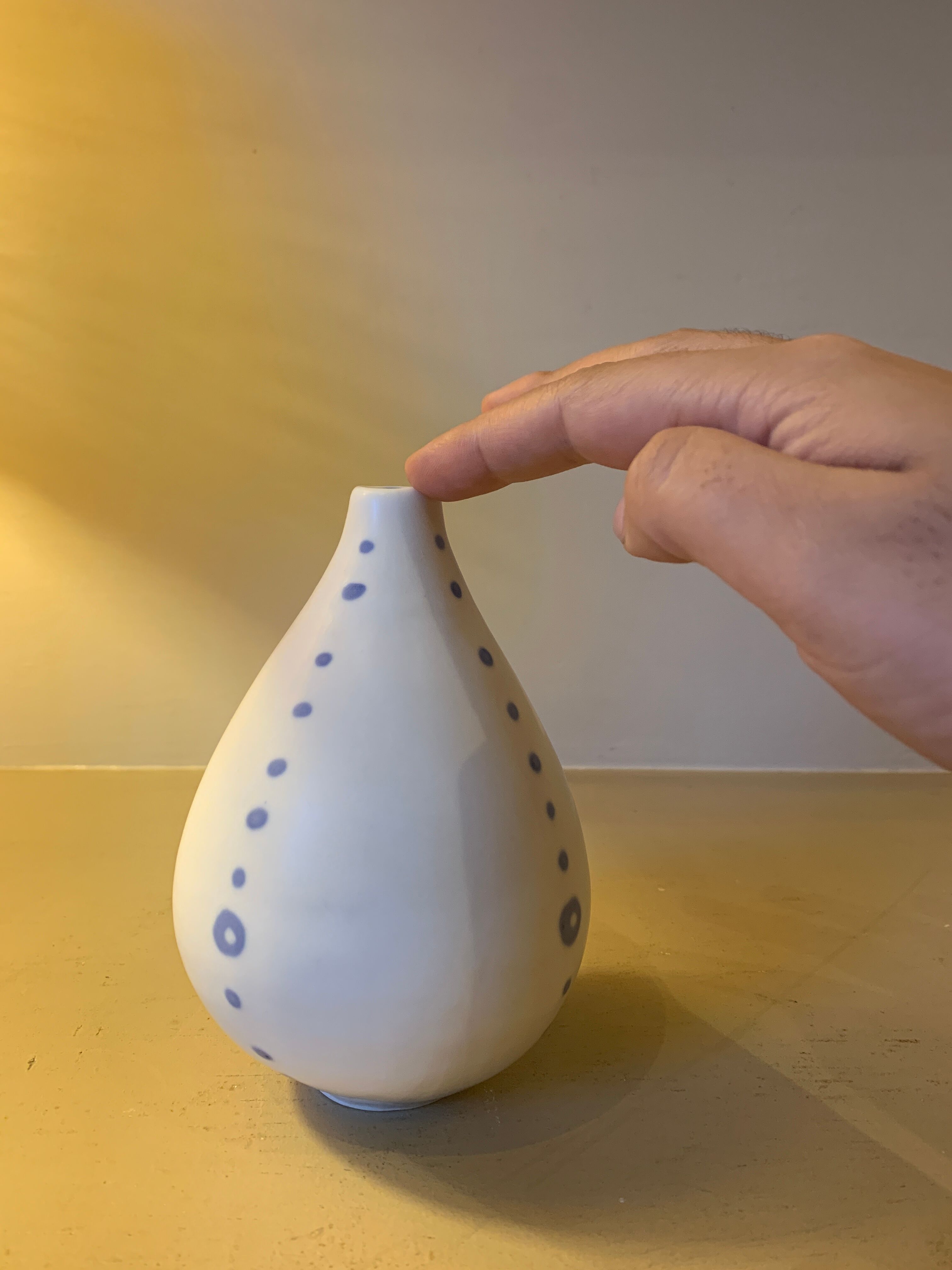 White ceramic with polka dots