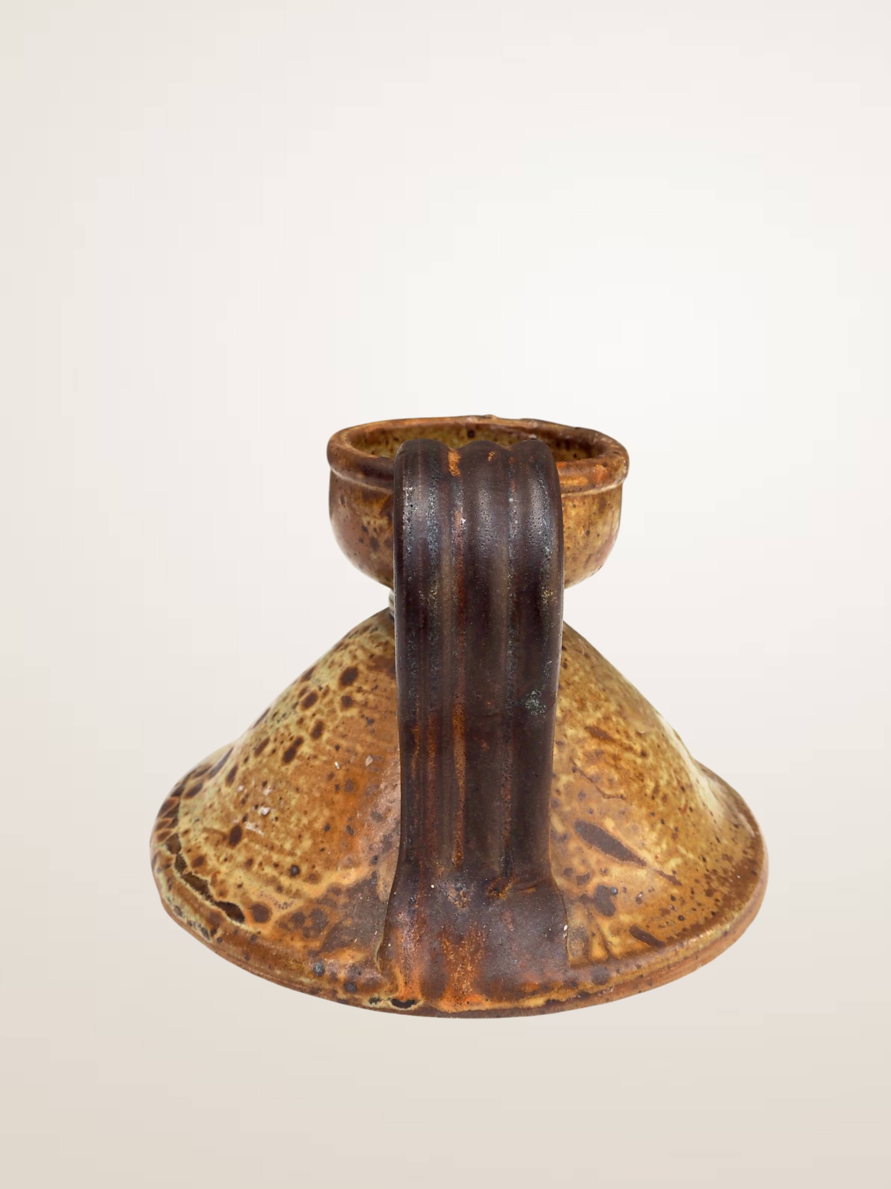 Handcrafted stoneware candle holder