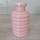 Set of pink and gold ceramic bathroom accessories