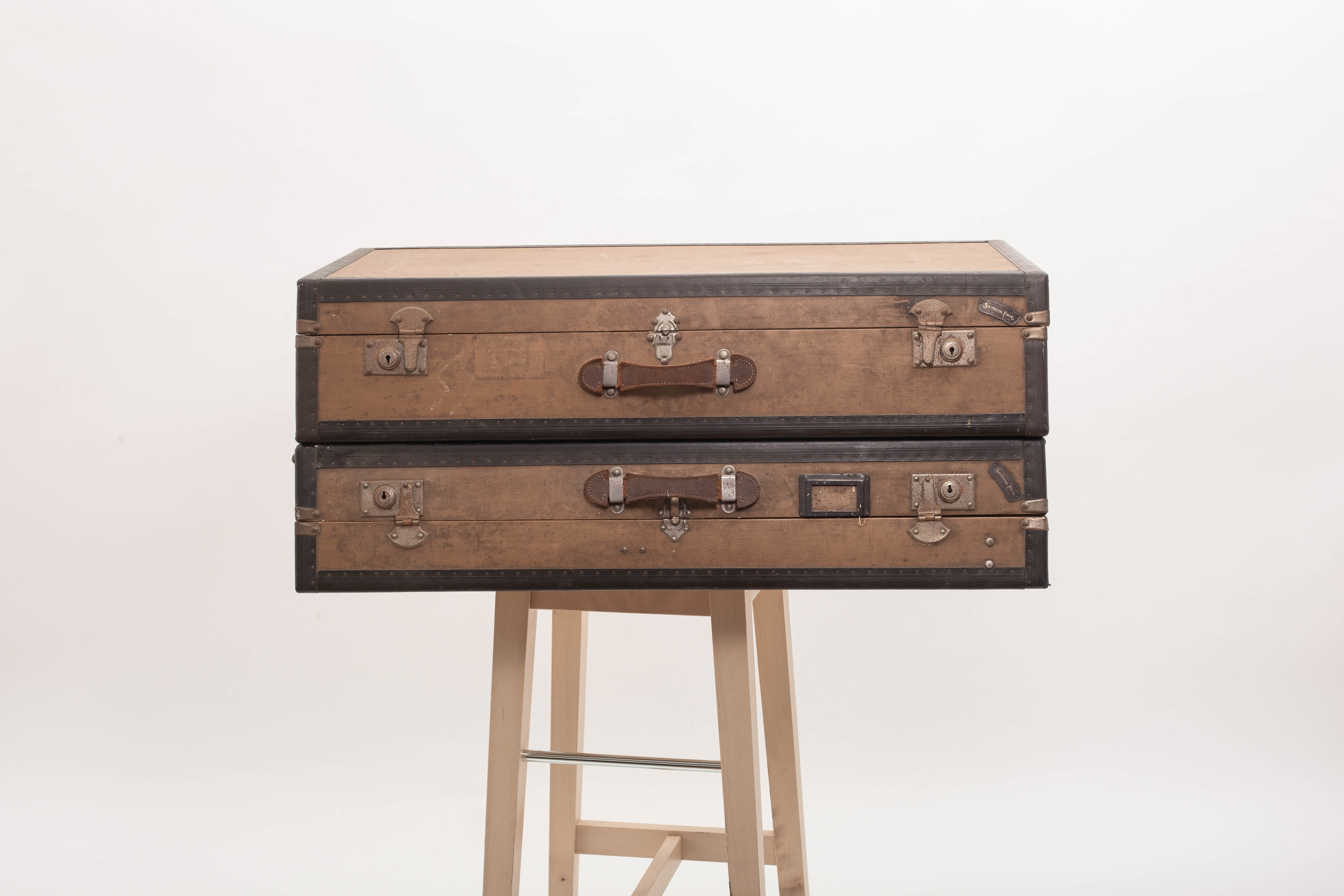 Pair of old rigid suitcases for cars