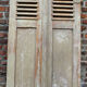 Old pair of wooden shutters 152 cm