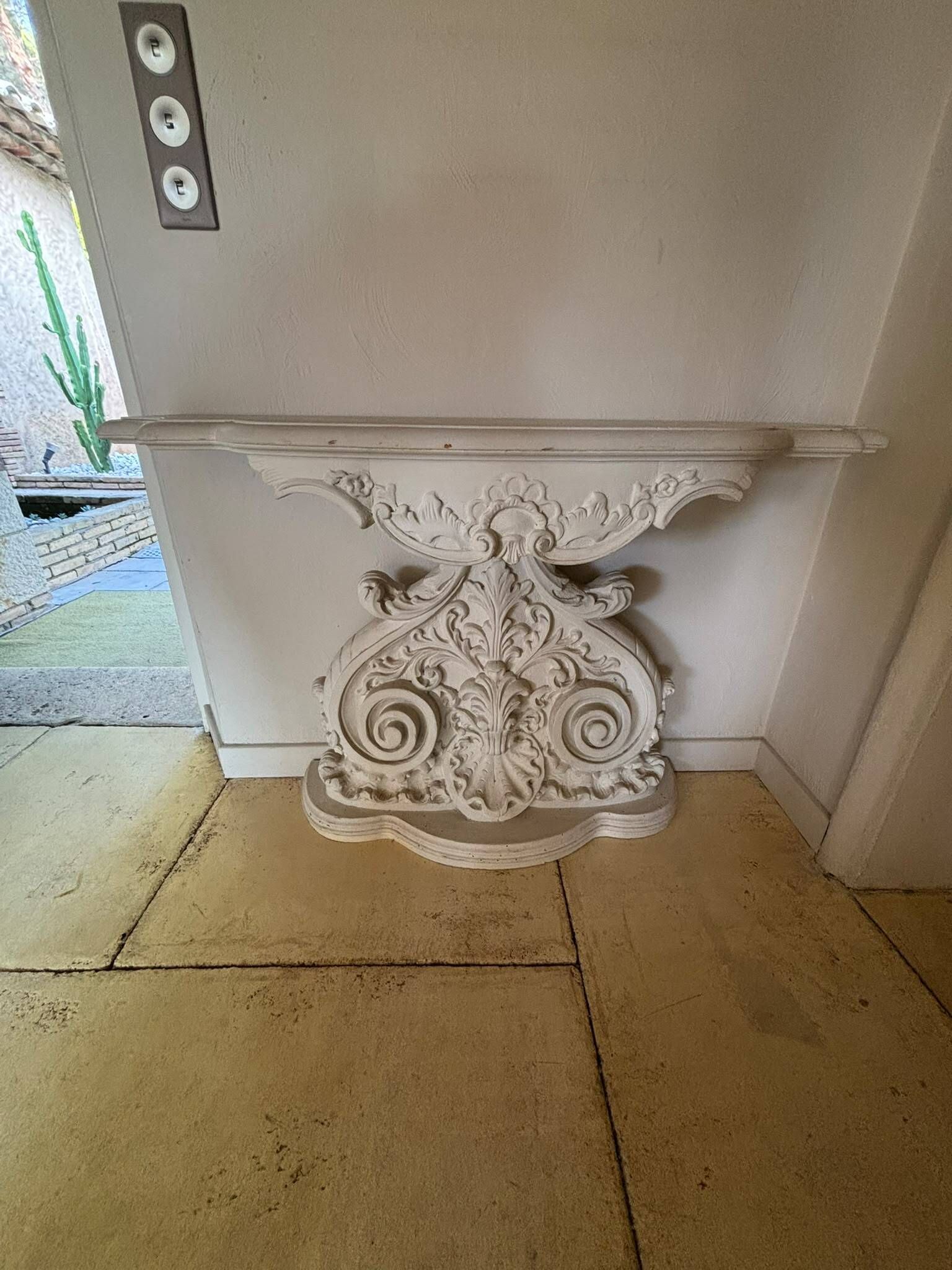 White carved wall entry console