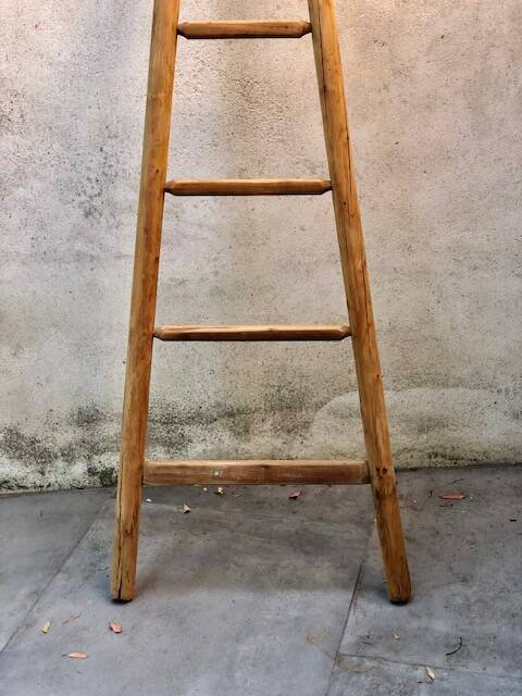 Wooden triangular ladder