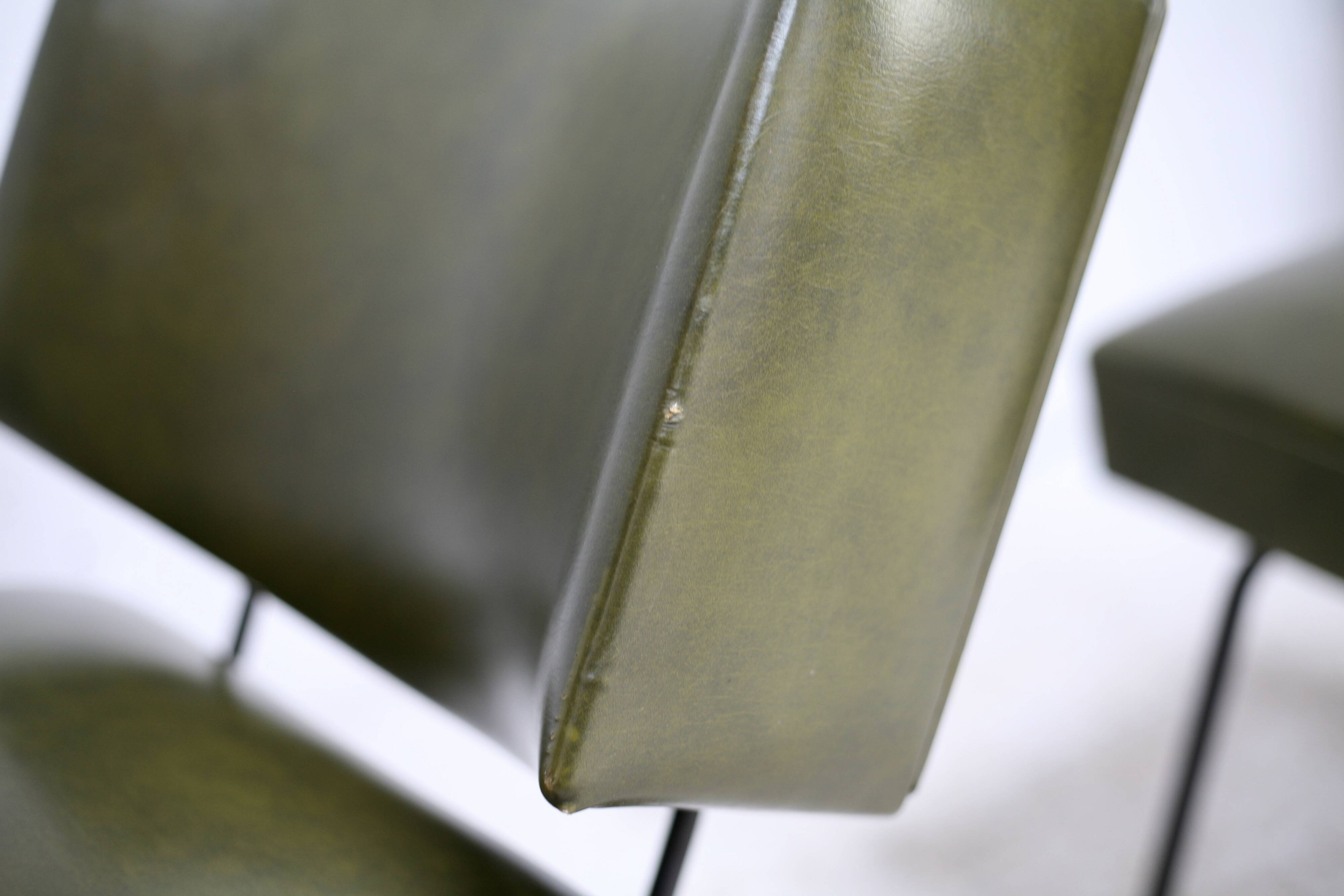 Pair of tubular armchairs, imitation leather. Circa 1950