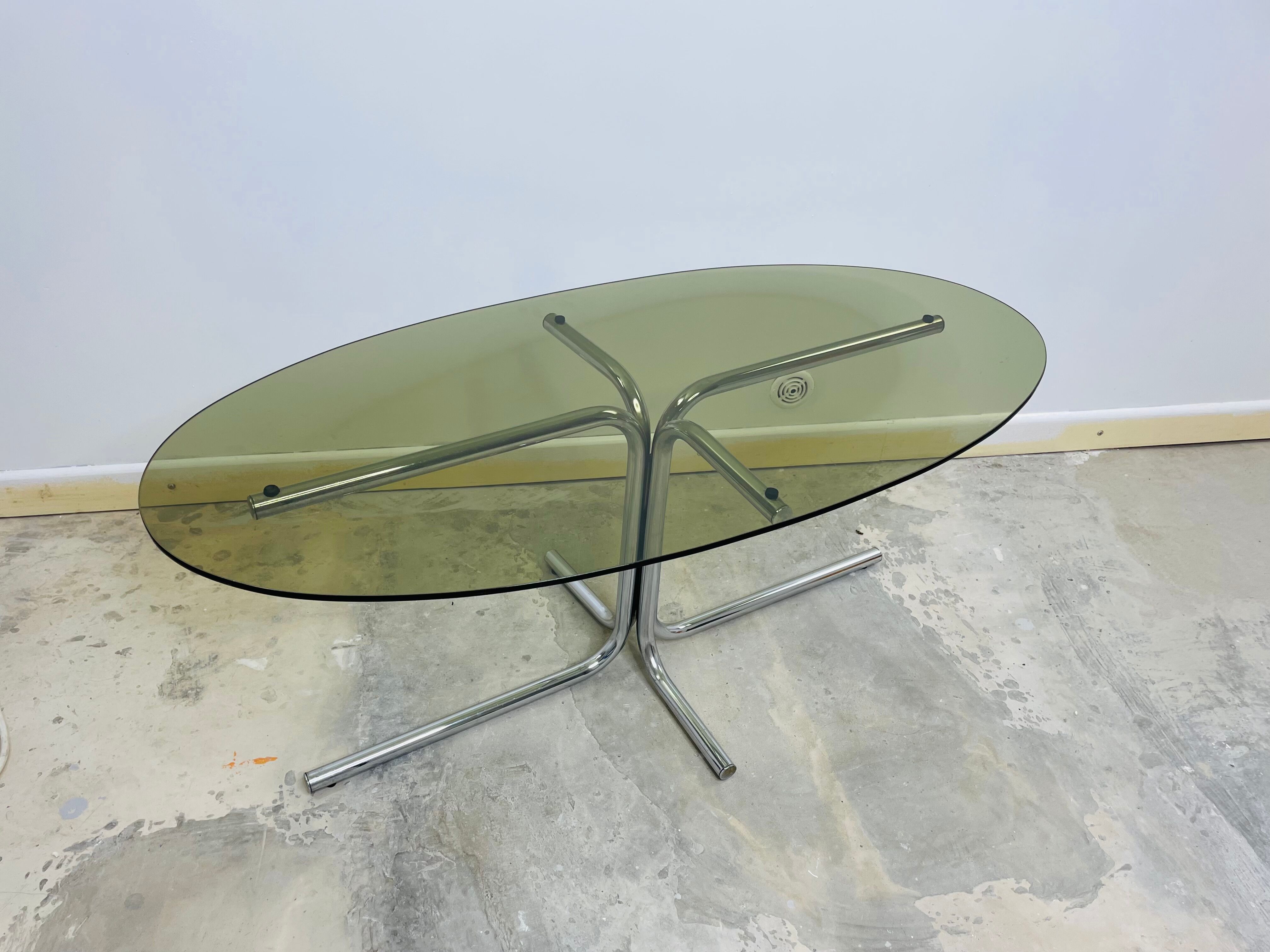 Vintage seventies coffee table in glass and stainless steel