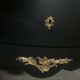Louis XV style curved black matte commode with gilded bronze ornamentation from the 1950s.