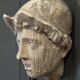 Antique plaster sculpture of a female face from the early 20th century